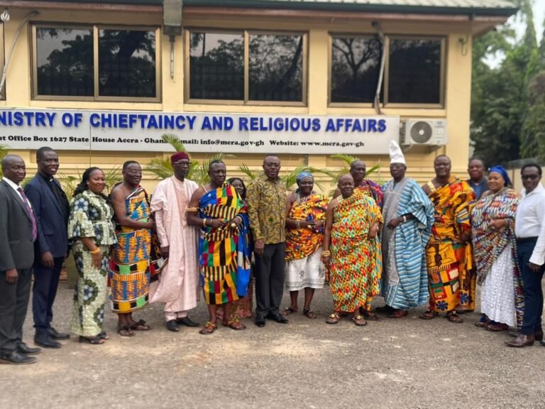 Stephen Asamoah Boateng flanked by some chiefs and officers of the ministry
