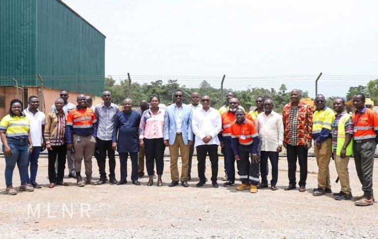 (7th right) George Mireku Duker, Deputy Lands Minister, in a group photo with some workers of the Golden Star Wassa Limited