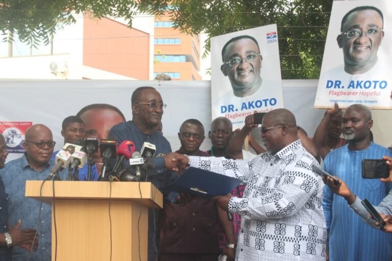 (Left) Dr Owusu Afriyie Akoto receives his nomination form