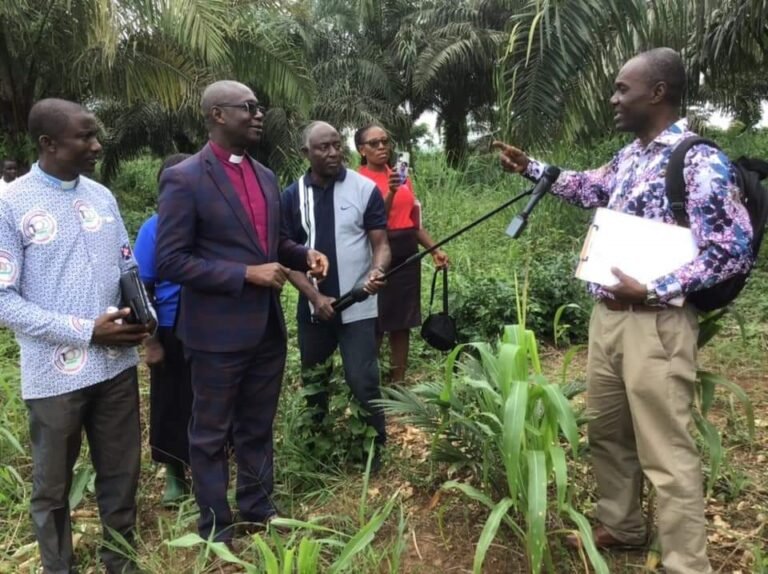 Rev. Dr. Seth Kissi, Akyem Abuakwa Presbytery Chairperson of PCG, on farm inspection