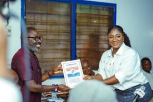 (Right) Akosua Manu submits her nomination forms