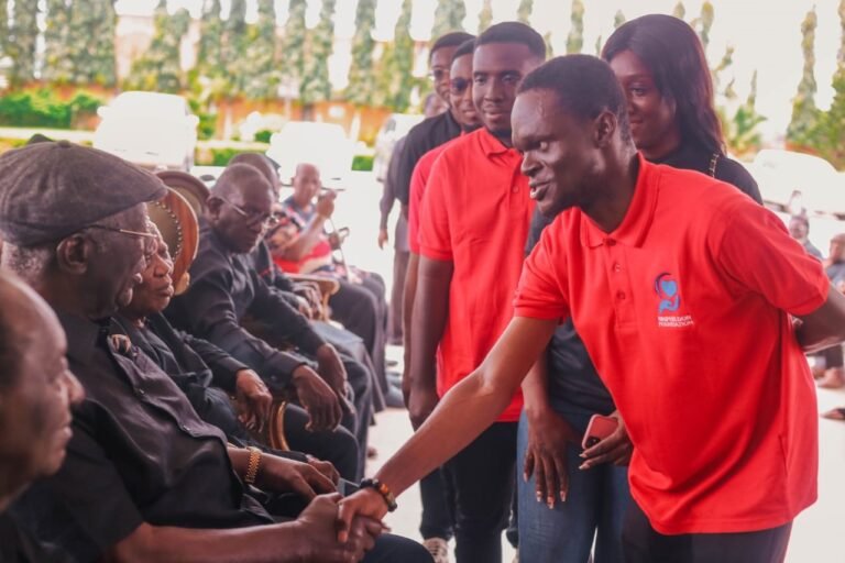 The delegation greeting former President Kufuor
