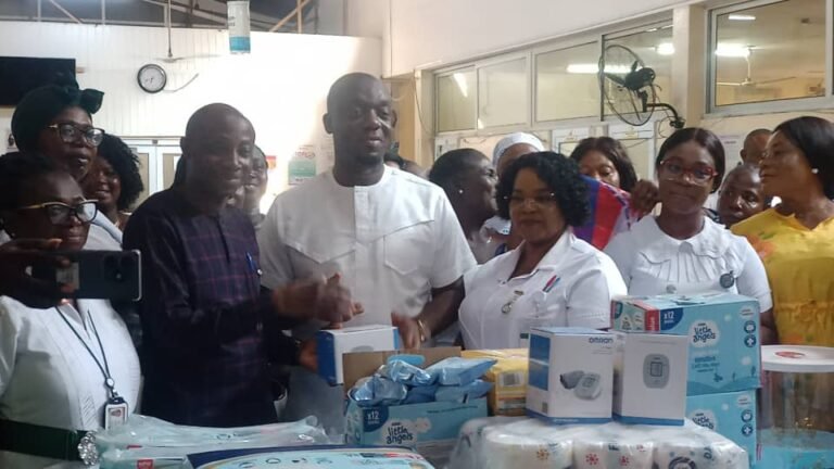 (4th right) Justin Frimpong Kodua, NPP General Secretary, makes presentation to HoD of the Obstertrics & Gynecology at KBTH